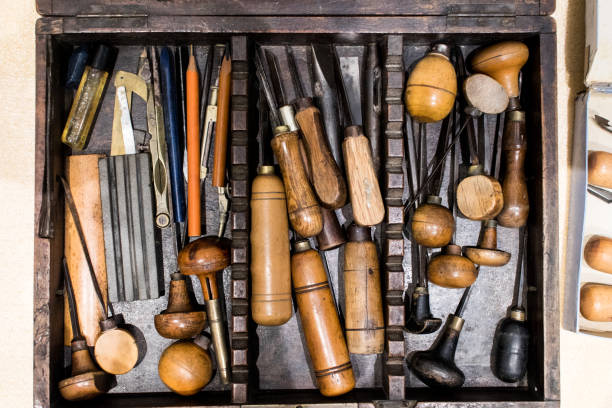 istock Antique tools for engraving and printing in a wooden case. 998432820