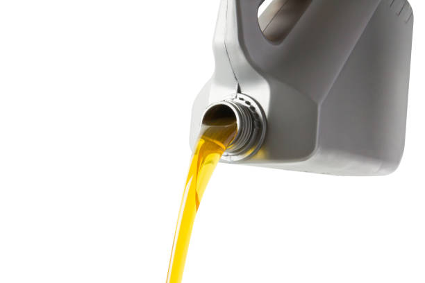 istock pouring motor oil from silevr plastic gallon bottle isolate on white background 998444174