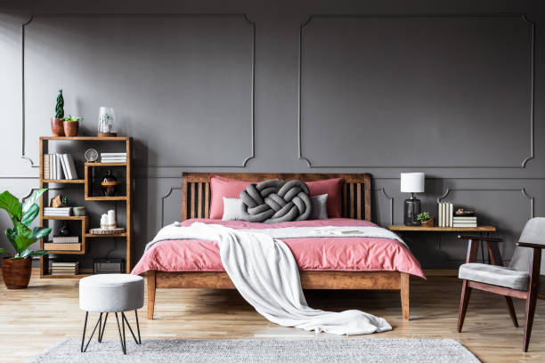 istock Grey and pink cozy bedroom 998444344