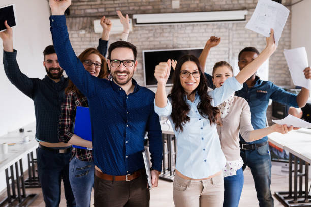 istock Portrait of successful business team posing in office 998448024
