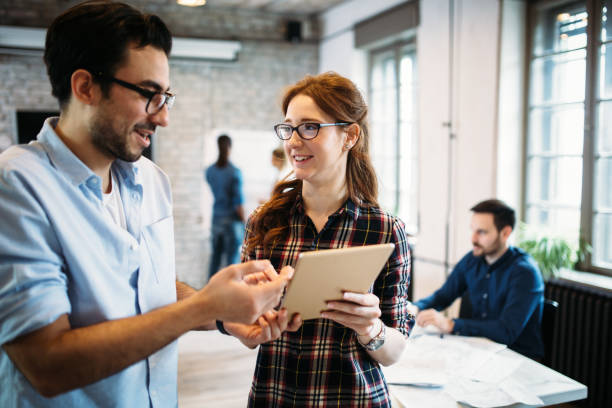 istock Portrait of architects having discussion in office 998450676
