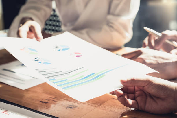 istock Business People Analyzing Statistics Business Documents, Financial Concept 998453524