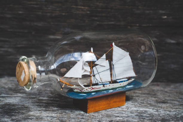 istock souvenir ship in bottles on the table 998457964