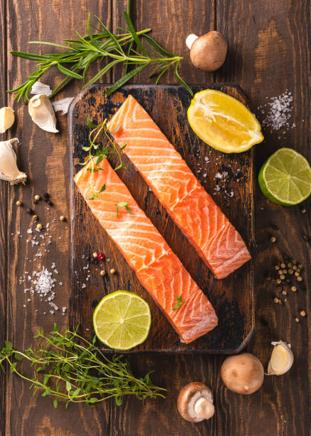 istock Fresh raw salmon fillet, flat lay 998461006