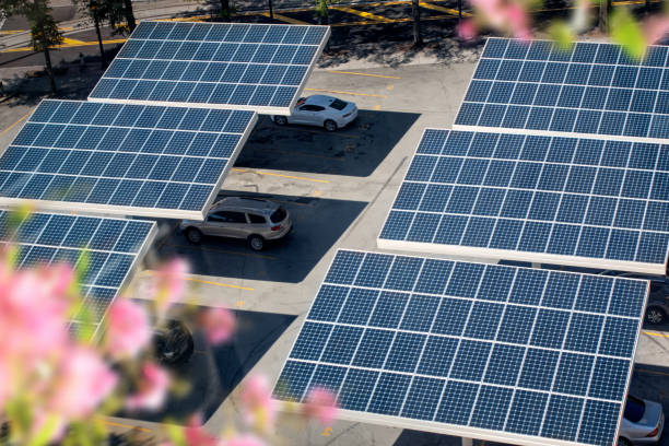 close up solar panels placed on a city public parking lot Elevated view of solar panels placed on a city parking lot in Atlanta, Georgia ecological reserve photos stock pictures, royalty-free photos & images