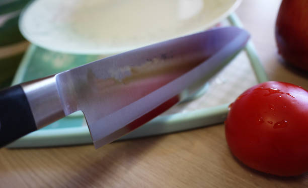 istock Japanese kitchen knife. Very sharp and comfortable. An indispensable thing for any housewife 998496032