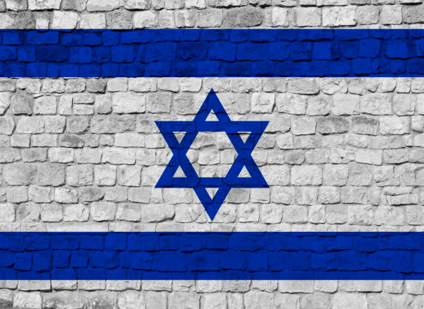 istock Flag of Israel on Wall Background 998496968