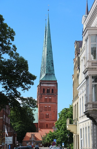 beautiful church in the city with apartment buildings in the front