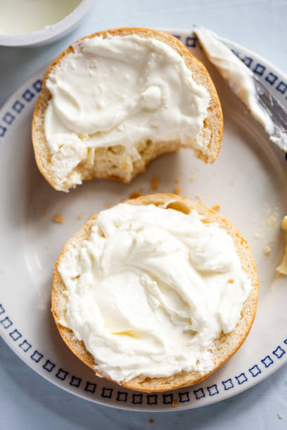 istock Roll with butter and cream cheese 998502286