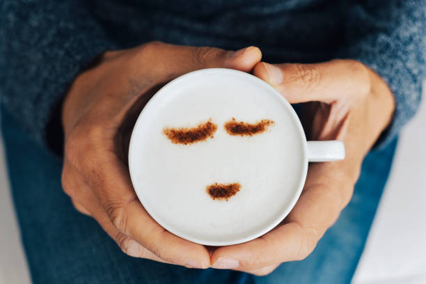 istock man with a cup of cappuccino 998505926