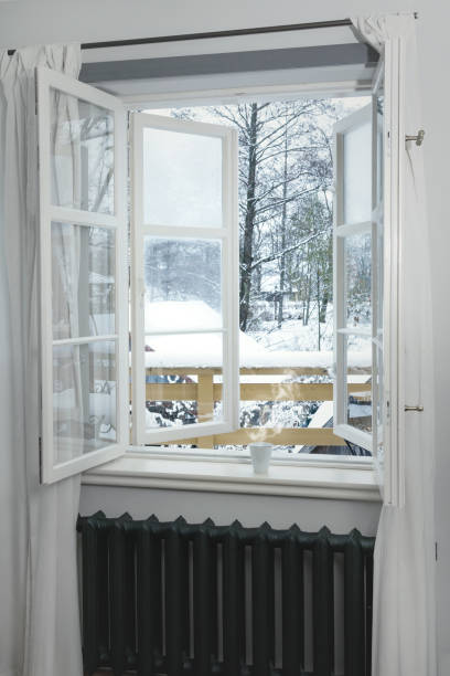 istock Cup of hot drink on the windowsill 998519954