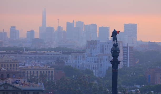 Colon Statue on Barcelona, wearing a life saving device in his right arm, Open Arms activist hank it on the statue to protest about migrant crisis