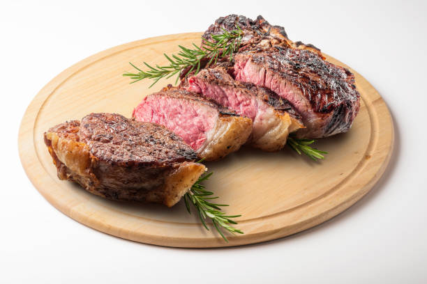 istock Fiorentina T-bone steak cut on round wooden chopping board 998554692