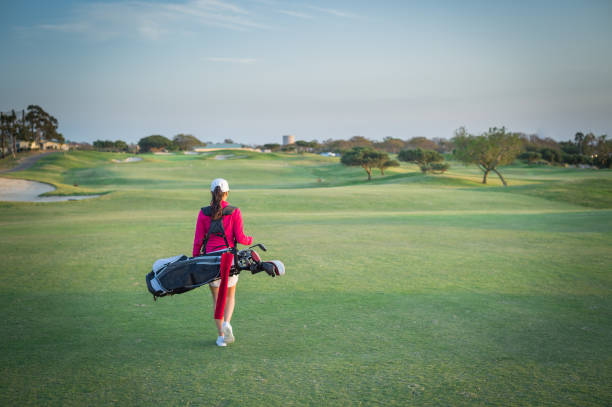 istock Hispanic Women Golfer Walking 998567020