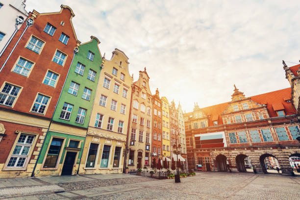 istock Old tenement houses and a gate. 998570422
