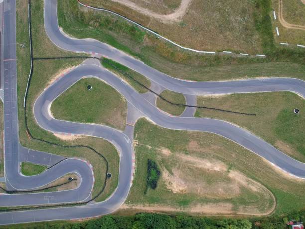 istock Asphalt racing track, snake shape, aerial view 998590616