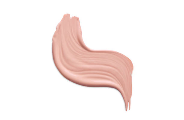 istock Cosmetic liquid foundation cream smudge smear strokes. Make up smear isolated on white background 998593534