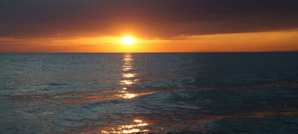 istock Sunset over the seahorizon 998594960