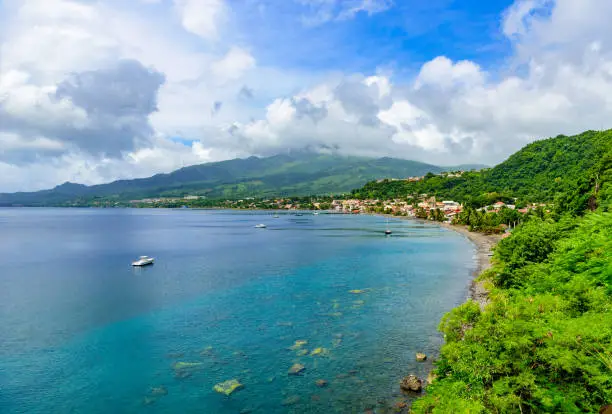 Paradise coast at Saint Pierre with Mt. Pelee, active volcanic mountain in Martinique, Caribbean Sea