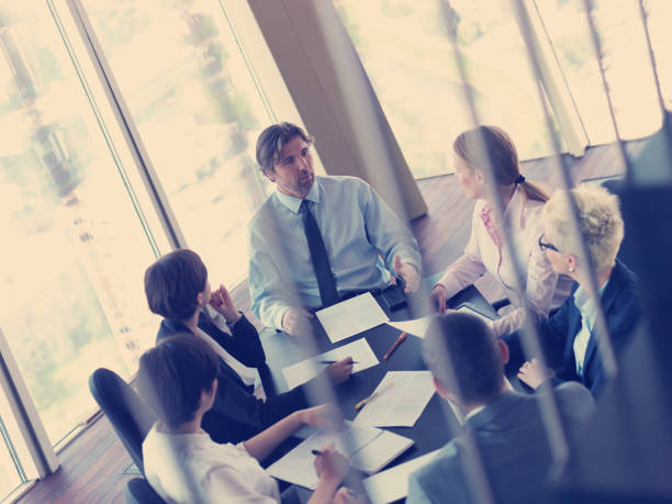 istock business people group on meeting at bright modern office 998598930