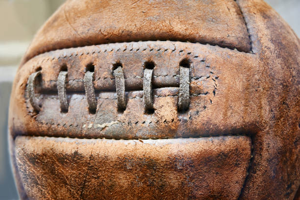istock Old leather soccer ball 998607878