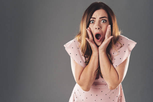 istock Astonished woman 998618422