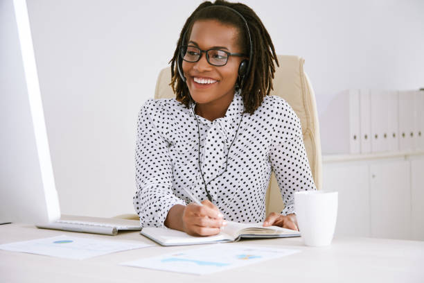 istock Happy working business woman 998633500