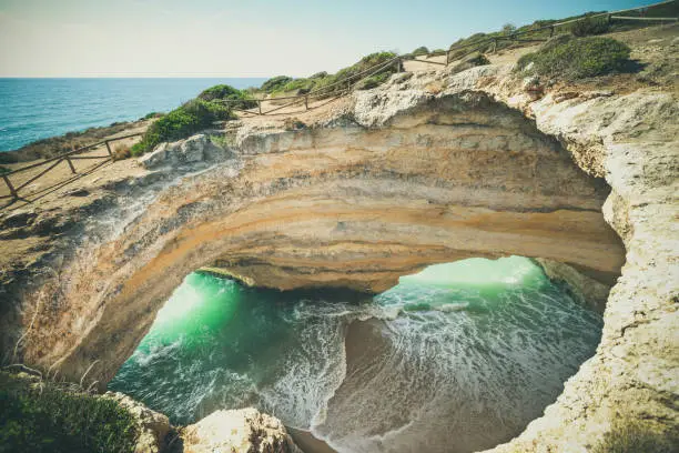 beautiful cave of benagil at the algarve coastline near lagos in portugal.