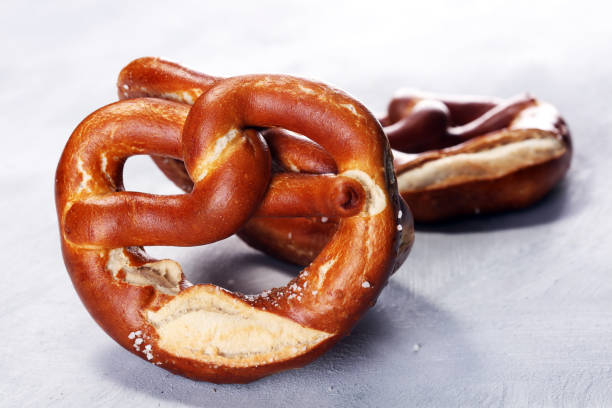 istock German pretzels with salt close-up on the table 998671174