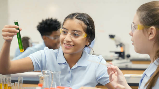 istock Preteen girl marvels at science experiment results 998687902