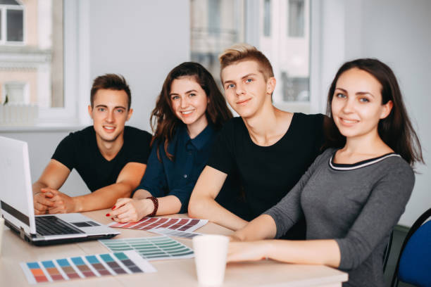 istock team of designers sitting together at studio 998688662