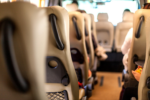 A trip in a minibus, seats in the interior of the cabin