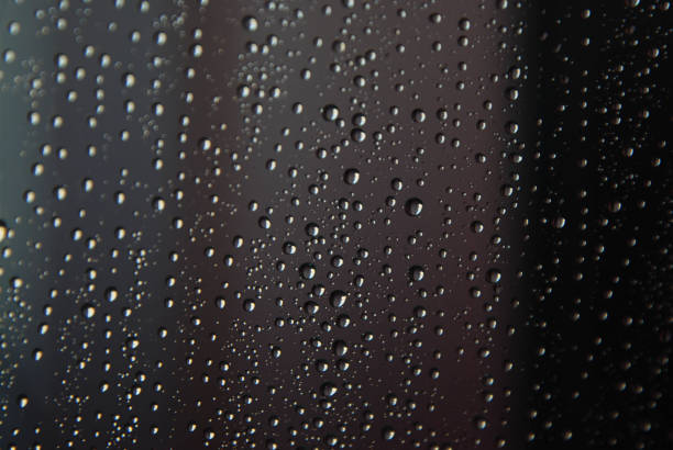 istock Raindrops Water Drops Texture Backgrund Window Glass Selective Focus 998698988