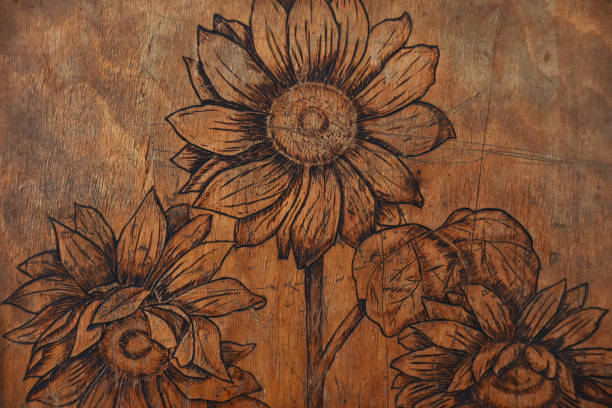Old vintage textured flower pattern on old wooden sheet