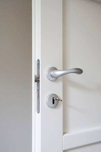 istock lock and handle of wooden door 998700016