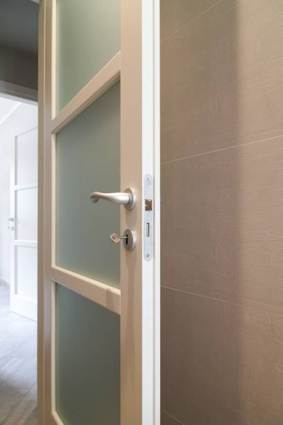 istock lock and handle of wooden door 998700038