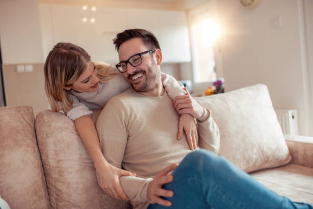 istock Cute young couple at home 998706136