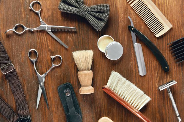 istock Barber Equipment And Tools On Wood Table 998716344