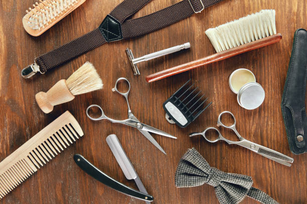 istock Barber Equipment And Tools On Wood Table 998716636