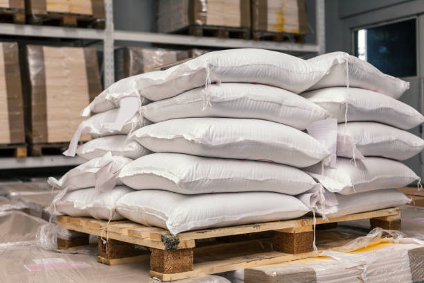 sacks of flour sacks of flour on pallets in warehous cement bag stock pictures, royalty-free photos & images