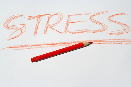 Stress sign. Stress note, written with red crayon.
