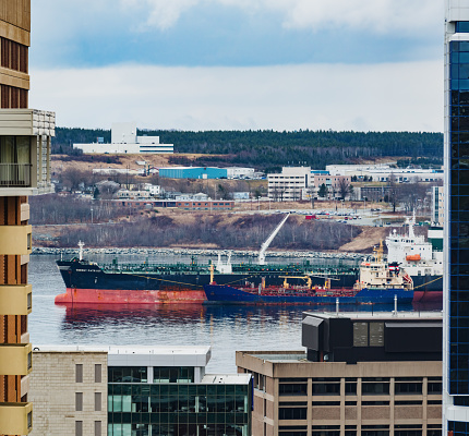 Oil tanker is refueled in Halifax harbor.