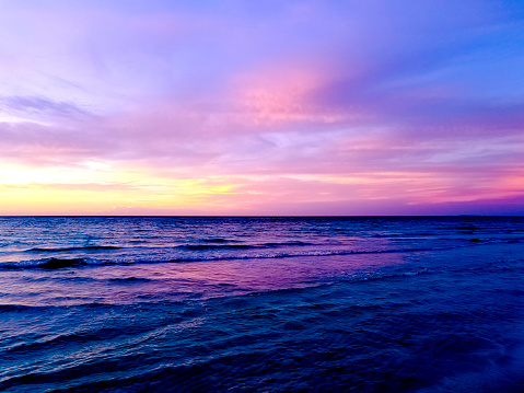 Dramatic sunset over the water on Cuban beach