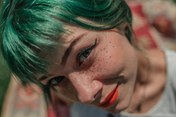 istock Girl with green hair 998775094