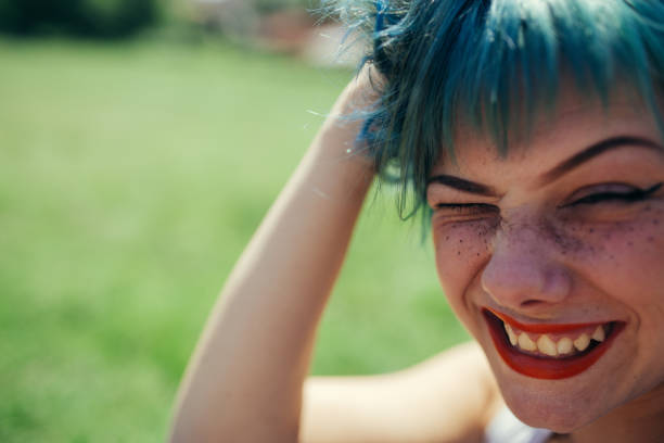 istock Girl with green hair 998801168