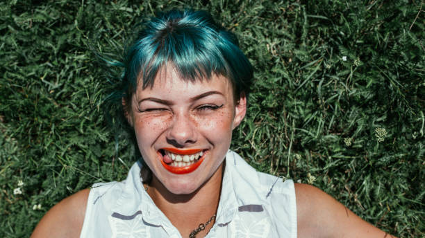 istock Girl with green hair 998803638