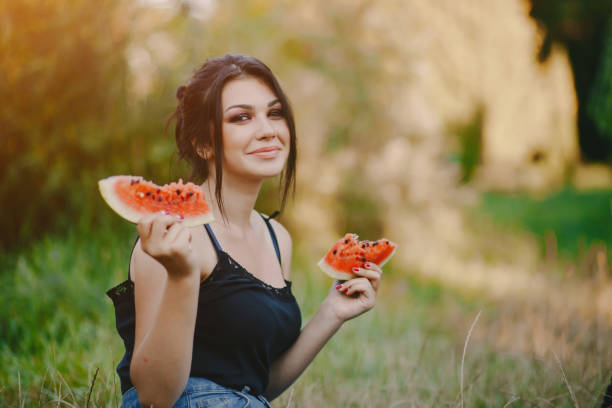 istock girls with watermelon 998816786