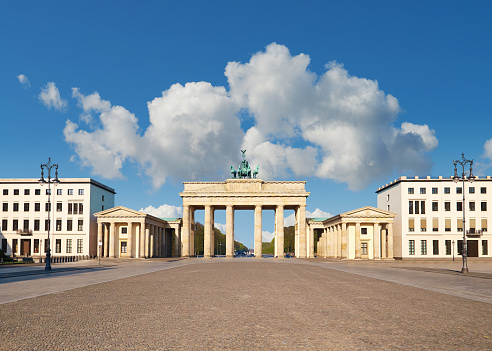 Brandenburg Gate in Berlin, Germany, on a bright day. Front shot, space for your text