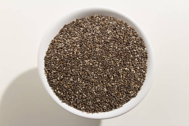 istock Close-Up Of Seed In Bowl On White Background 998822644