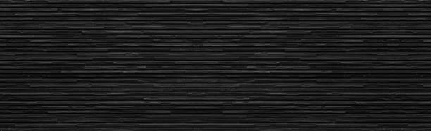 istock Panorama of black modern stone wall background and pattern 998828566